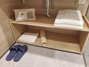 Postel nebo postele na pokoji v ubytování Hu House