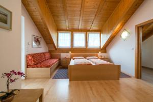 Letto o letti in una camera di Dissertorihof