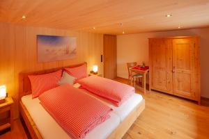 Säng eller sängar i ett rum på Alpin Aparts