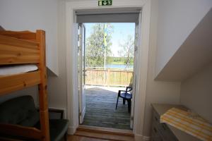 Säng eller sängar i ett rum på Semesterhemmet Sommarro