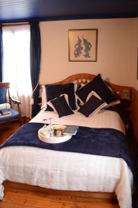 Letto o letti in una camera di Gîte au Toit Bleu
