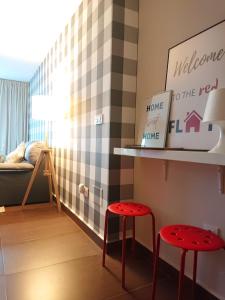 Postel nebo postele na pokoji v ubytování The Red Flat Vigo - Estudio Boutique - Centro Ciudad