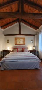 מיטה או מיטות בחדר ב-Altana Sul Tetto