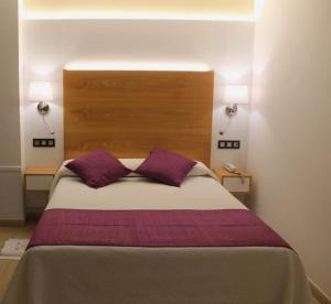 Postel nebo postele na pokoji v ubytování Hotel La Noyesa *** Superior