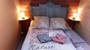 Кровать или кровати в номере Au Coeur de la Nature
