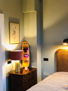 a bedroom with a bed and a skateboard on a dresser at HOMESTEAD Amsterdam in Amsterdam +13 photos
