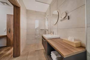 Koupelna v ubytování Seehotel im Weyer + 37 fotografií