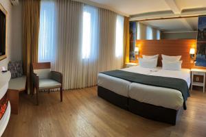 Postel nebo postele na pokoji v ubytování Hotel Kleiner Riesen