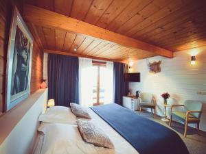 Postel nebo postele na pokoji v ubytování Nîdwazô - Ecolodge & Maison d'hôtes