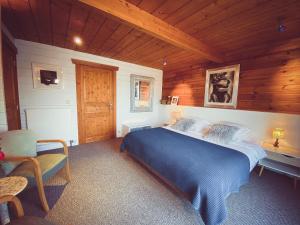 Postel nebo postele na pokoji v ubytování Nîdwazô - Ecolodge & Maison d'hôtes