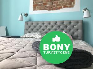 Posteľ alebo postele v izbe v ubytovaní Apartament Peowiaków Superior