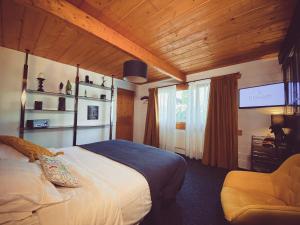 Postel nebo postele na pokoji v ubytování Nîdwazô - Ecolodge & Maison d'hôtes