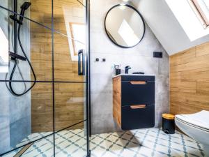 Kúpeľňa v ubytovaní Apartamenty Tatrzańskie Doliny