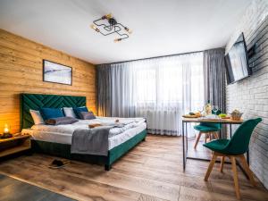 Posedenie v ubytovaní Apartamenty Tatrzańskie Doliny