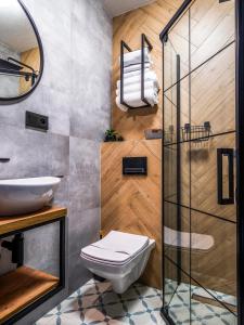 Kúpeľňa v ubytovaní Apartamenty Tatrzańskie Doliny