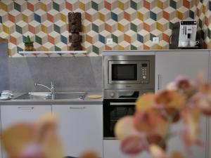 Kuhinja ili čajna kuhinja u objektu Plage à 50m Appartement Rêves de plage Villa Les Bains de Mers