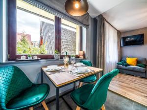 Posedenie v ubytovaní Apartamenty Tatrzańskie Doliny