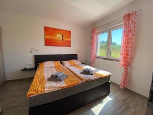Posteľ alebo postele v izbe v ubytovaní Villa Sabina - Apartments Kroatien