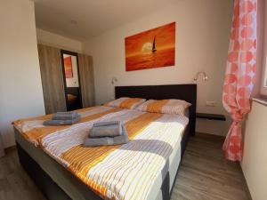 Posteľ alebo postele v izbe v ubytovaní Villa Sabina - Apartments Kroatien