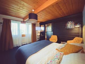 Postel nebo postele na pokoji v ubytování Nîdwazô - Ecolodge & Maison d'hôtes