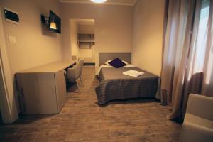 A bed or beds in a room at Dimora Risveglio