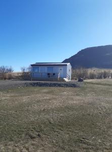 a large house in the middle of a field at Hagi 2 Road 62 nr 2 in Hagi