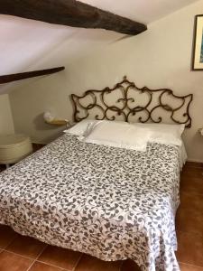 Postel nebo postele na pokoji v ubytování B&B La Fontana di Pegaso