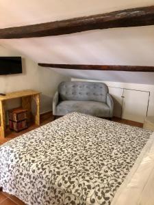 Postel nebo postele na pokoji v ubytování B&B La Fontana di Pegaso