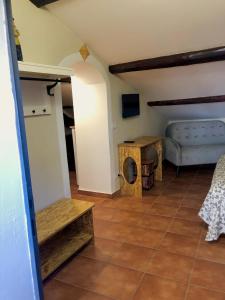 Postel nebo postele na pokoji v ubytování B&B La Fontana di Pegaso