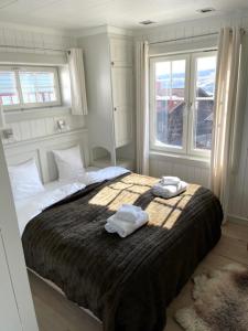 A bed or beds in a room at Åre Travel - Tottvillan