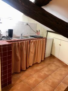 Kuchyň nebo kuchyňský kout v ubytování B&B La Fontana di Pegaso