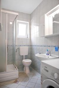 Koupelna v ubytování Golden Cape Apartments