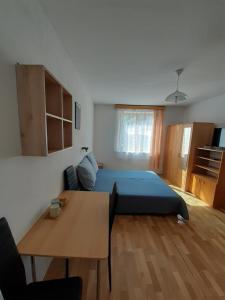 Postel nebo postele na pokoji v ubytování Penzion Fontána