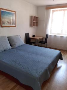 Postel nebo postele na pokoji v ubytování Penzion Fontána