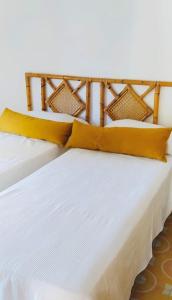 Ένα ή περισσότερα κρεβάτια σε δωμάτιο στο Casa Corallo - Santa Marinella