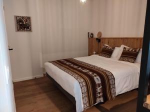מיטה או מיטות בחדר ב-B&B In den Roden Schilt