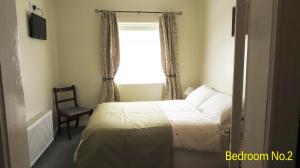 Voodi või voodid majutusasutuse Lissadell Holiday Apartment toas