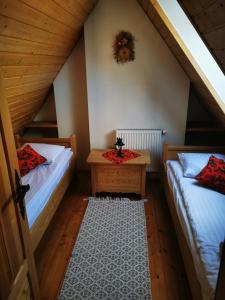 Tempat tidur dalam kamar di Zakopane apartament