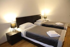 Ένα ή περισσότερα κρεβάτια σε δωμάτιο στο Hotel Chubu