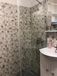 Kúpeľňa v ubytovaní Apartmani Roxy