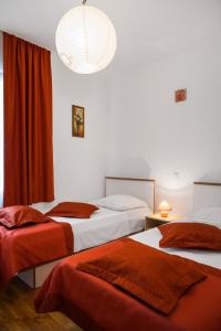 Postel nebo postele na pokoji v ubytování Golden Cape Apartments