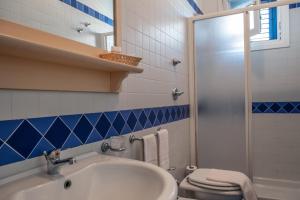 Koupelna v ubytování Orsola Apartments