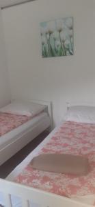 Postel nebo postele na pokoji v ubytování Apartman Sara vl. Franjo Klasić