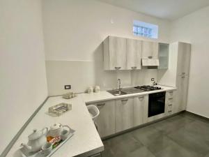 Kuchyň nebo kuchyňský kout v ubytování B&B DEL CORSO