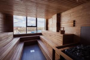 a room with a sauna with a large window at Hostel Tartu in Tartu