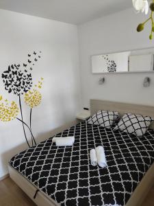 Posteľ alebo postele v izbe v ubytovaní White Pigeon