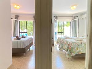 Posteľ alebo postele v izbe v ubytovaní Aljamar 6 Burriana Beach Casasol