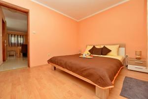 Posteľ alebo postele v izbe v ubytovaní Apartment Kokic