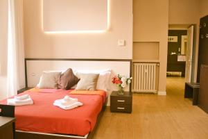 A bed or beds in a room at TheWesley