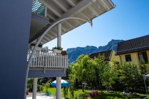 a balcony with a view of the mountains at Villa Miriam in Levico Terme